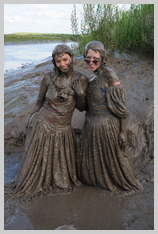 Isabeau and Lady Jennifer meet the mud in gorgeous gowns featuring Lady Jennifer, of Southwold Tower Isabeau and Lady Jennifer meet the mud in gorgeous gowns featuring Lady Jennifer, of Southwold Tower