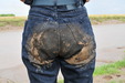 Designer Jeans Mud Bath view details of set gm-2m10, Chastity wears Armani jeans into the mudbanks