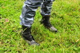 Urban Cammo Mudbath view details of set gm-2m12, Chastity wears combats, heeled DM boots, and a while jumper into the mudbanks