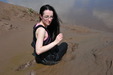 Violet in the Mudbanks view details of set gm-2m26, A leather-clad librarian goes mudbathing!