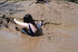 view details of set gm-4m036, Violet Vixen and Isabeau in spandex and leotards take a mudbath