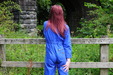 view details of set gm-4w034, Lucia wades deep into the river in a boilersuits and boots