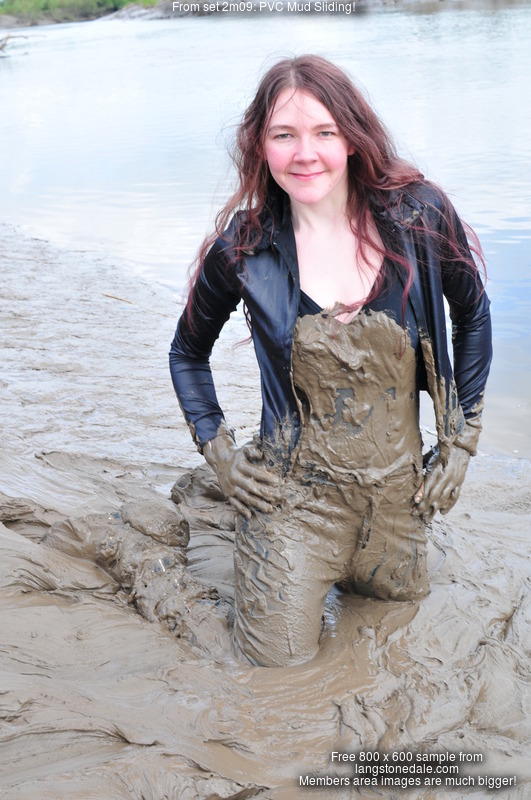 PVC Mud Sliding! - Chastity takes to the mudbanks in PVC jeans