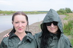 Green waterproofs in the mud